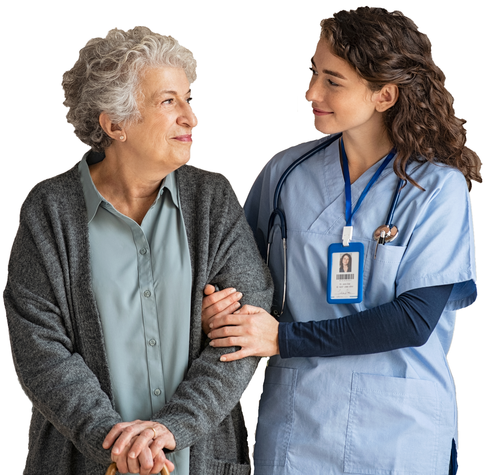 A healthcare worker in blue scrubs supports an elderly woman with a cane, both smiling A healthcare worker in blue scrubs supports an elderly woman with a cane, both smiling
