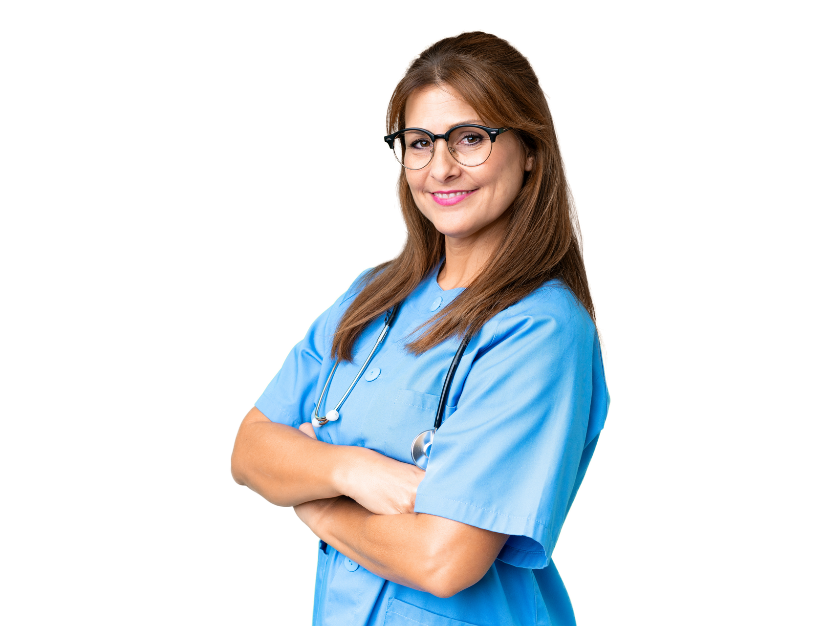 Woman in blue scrubs, glasses, and stethoscope smiles with arms crossed