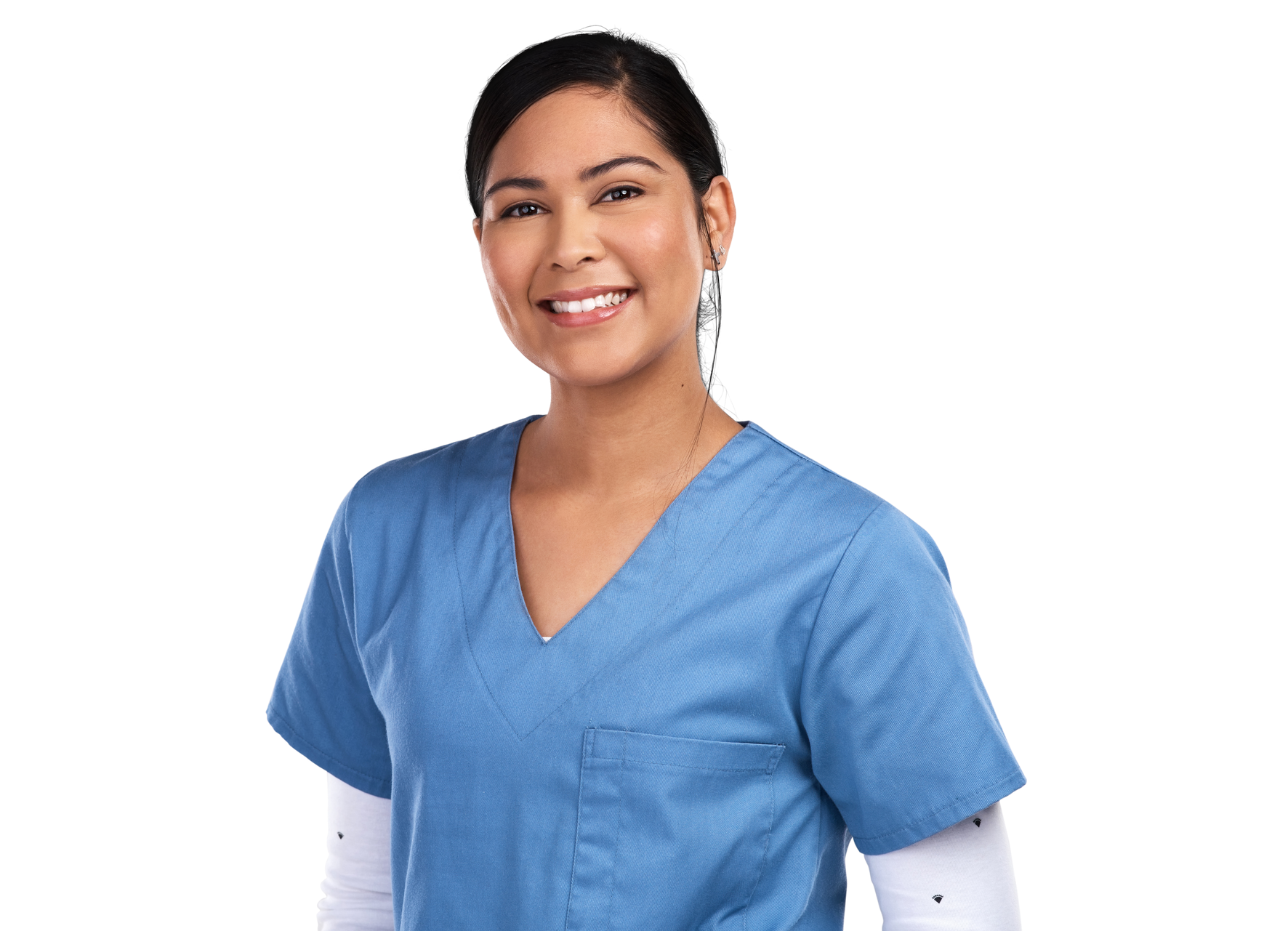Woman in blue scrubs smiles at the camera, arms at her sides, white background