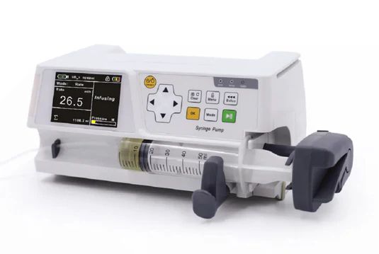 Infusion pump, white, with a syringe holding a yellow liquid, and a display screen.