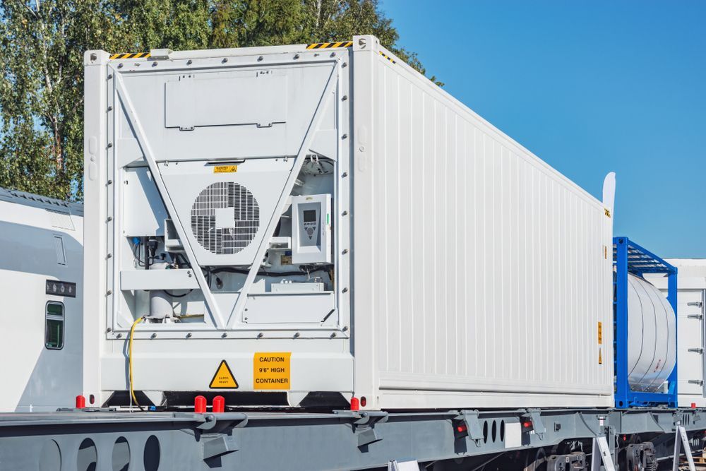 White Refrigerated Shipping Container on a Flatbed Truck — Hines Refrigerated Transport Pty Ltd in Taree, NSW