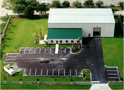 An aerial view of a building with a green roof