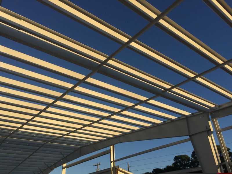 Looking up at the ceiling of a building under construction