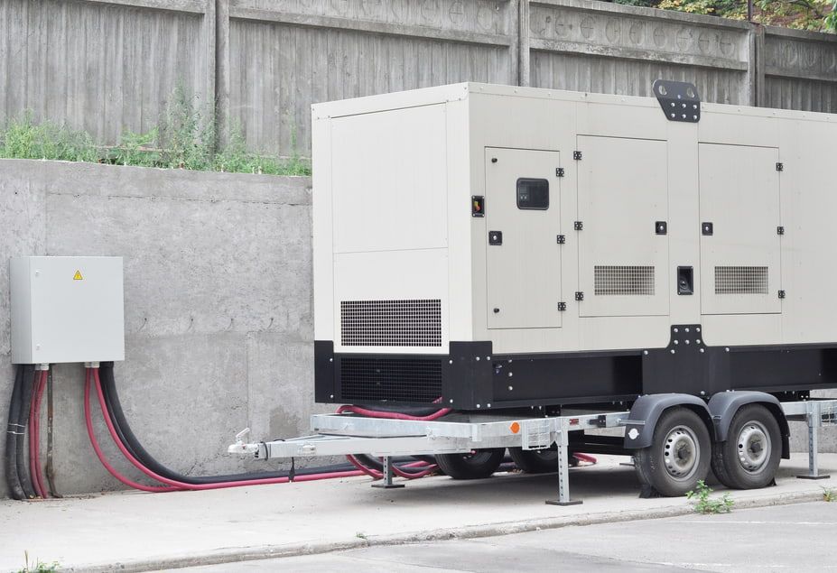 A Generator Is Attached To A Trailer On The Side Of The Road — A.G Auto Electrical & Air-Conditioning In Hidden Valley, QLD