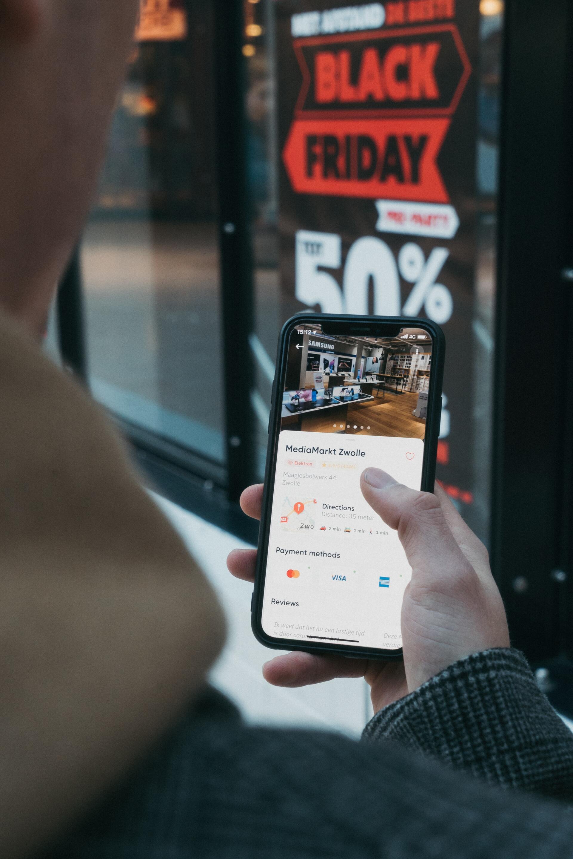 person watching advertising on his mobile phone