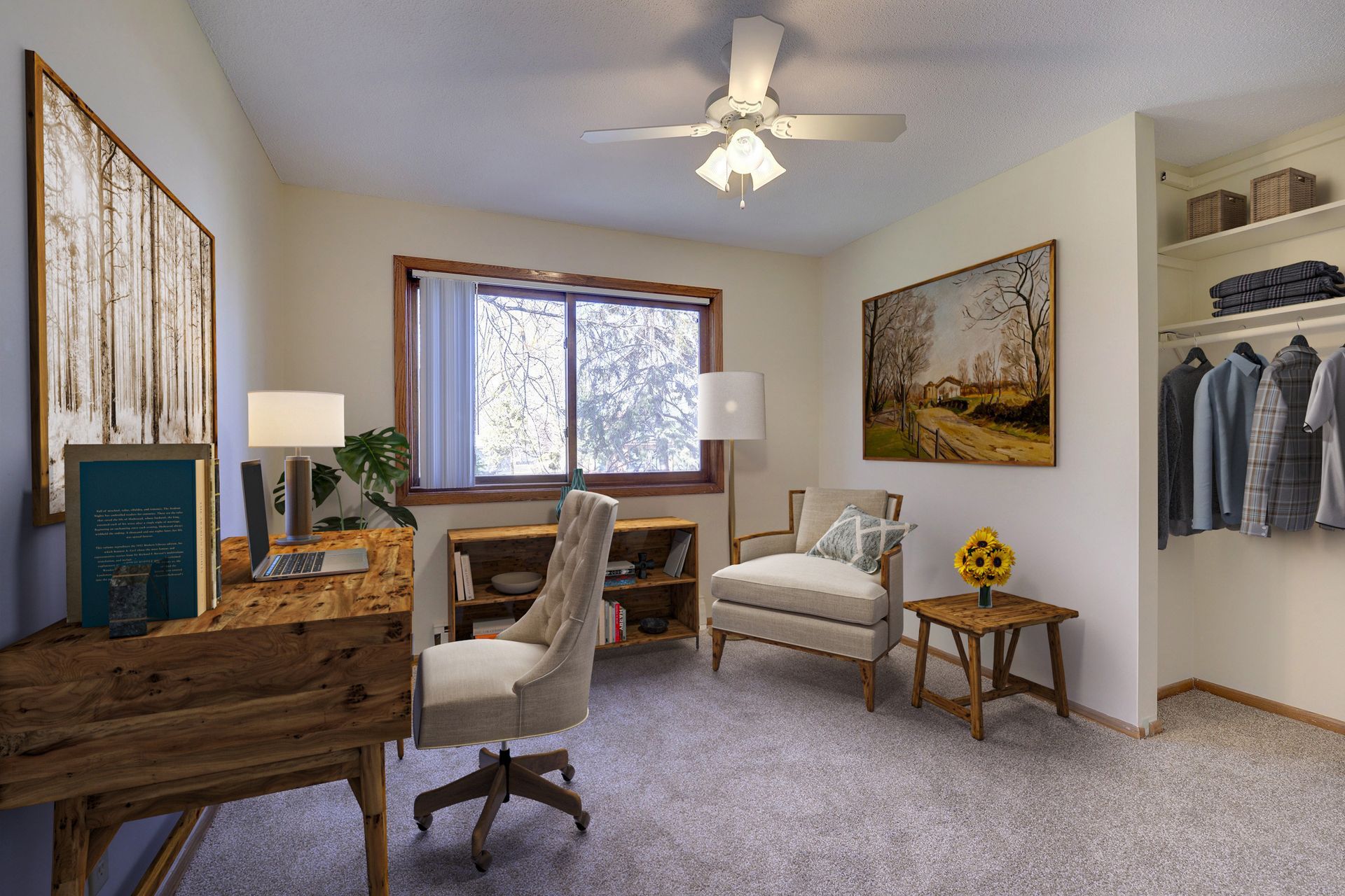 A living room with a desk , chair , and ceiling fan.