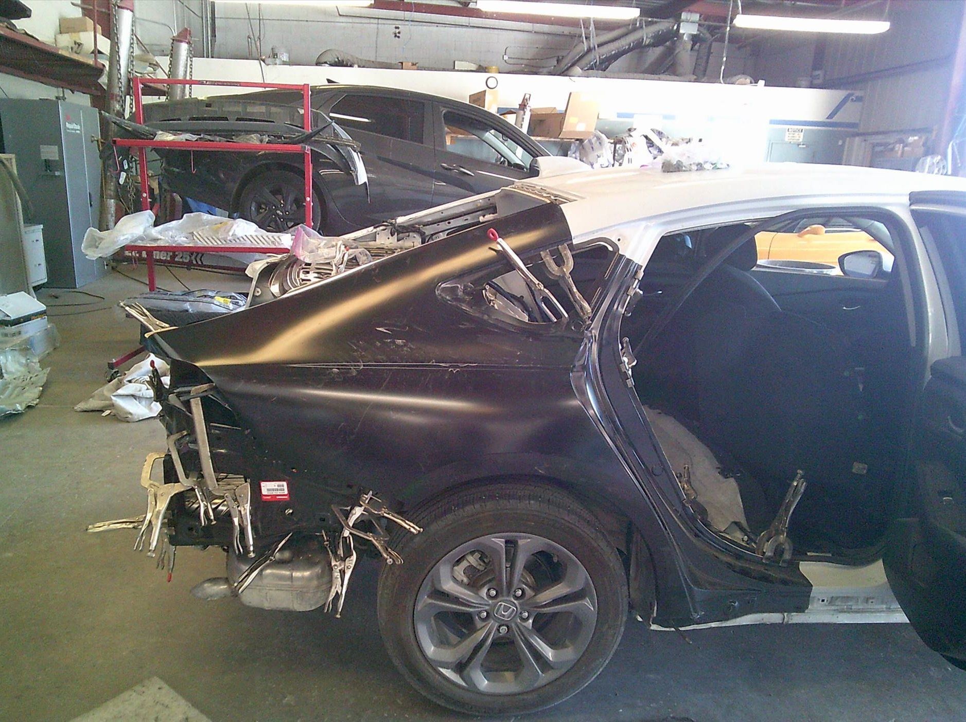 A car that has been damaged in a garage