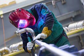 Industrial worker welding in metal factory - Welding and Crane Rental Services in Royersford, PA