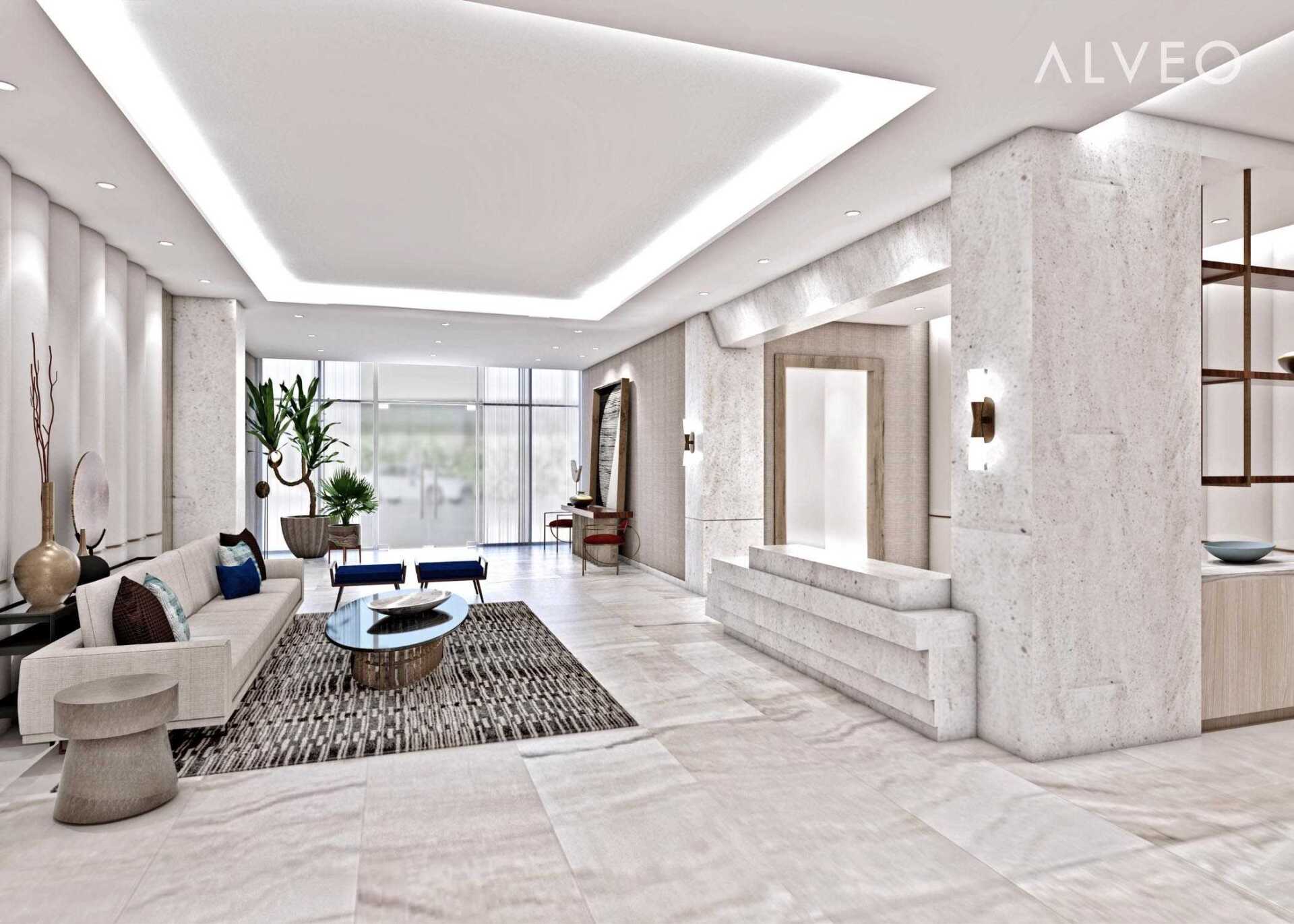 A living room with a couch and a table and the word alveo on the ceiling