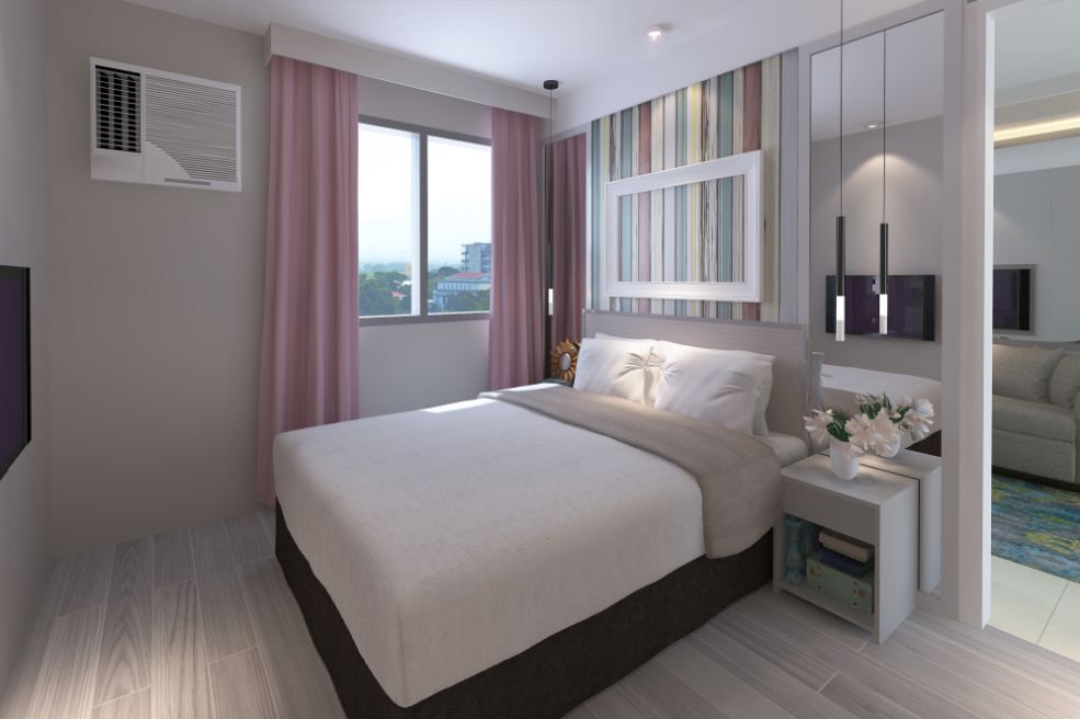 A bedroom with a bed , nightstand , mirror and window.