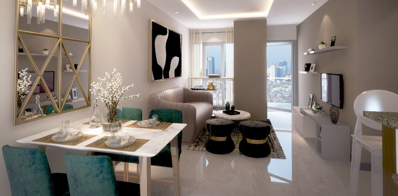 A living room with a dining table and chairs and a couch.