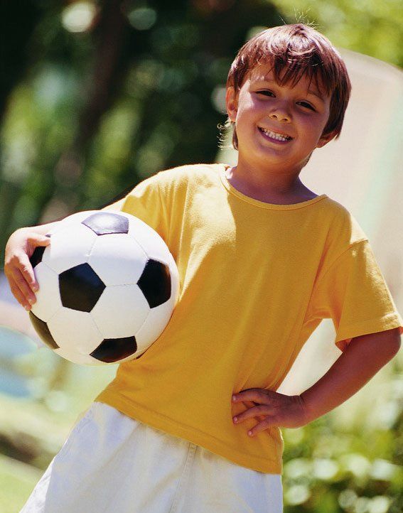 child with football