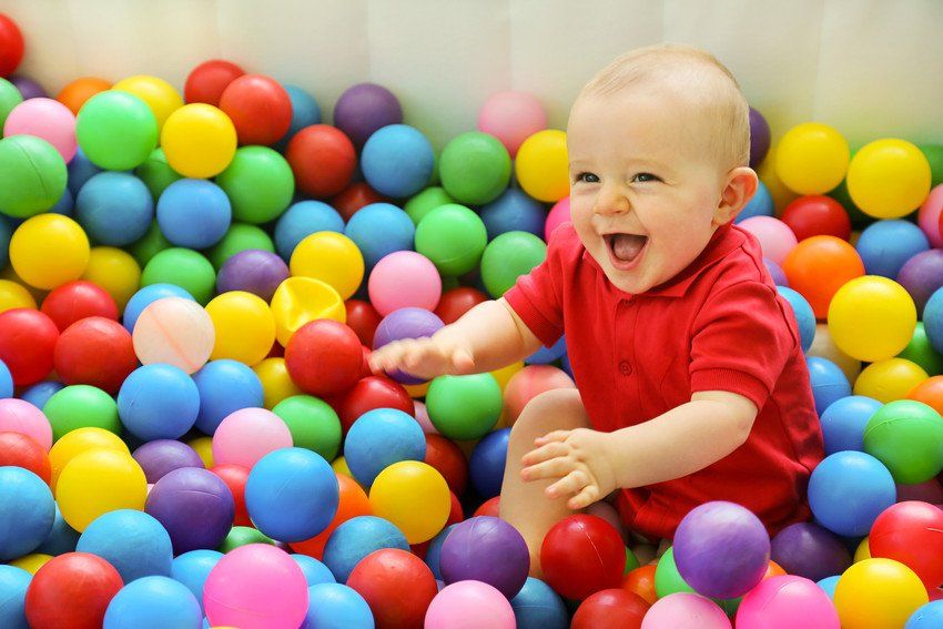 baby in a ball pit