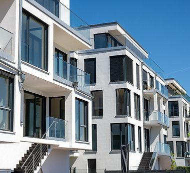 A building with a lot of windows and balconies
