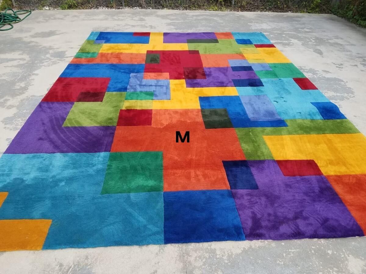 Before cleaning a colorful rug.