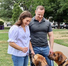 Evan with his wife and dog.