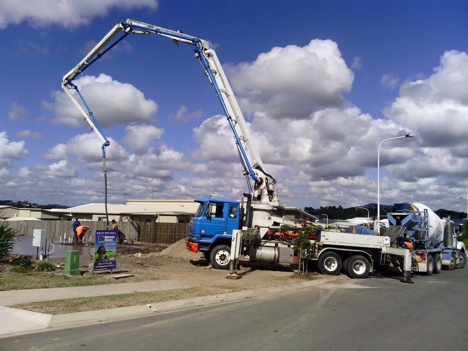 A Concrete Pump is Being Used on a Construction Site — Polley's Concrete Pumping in Rural View, QLD