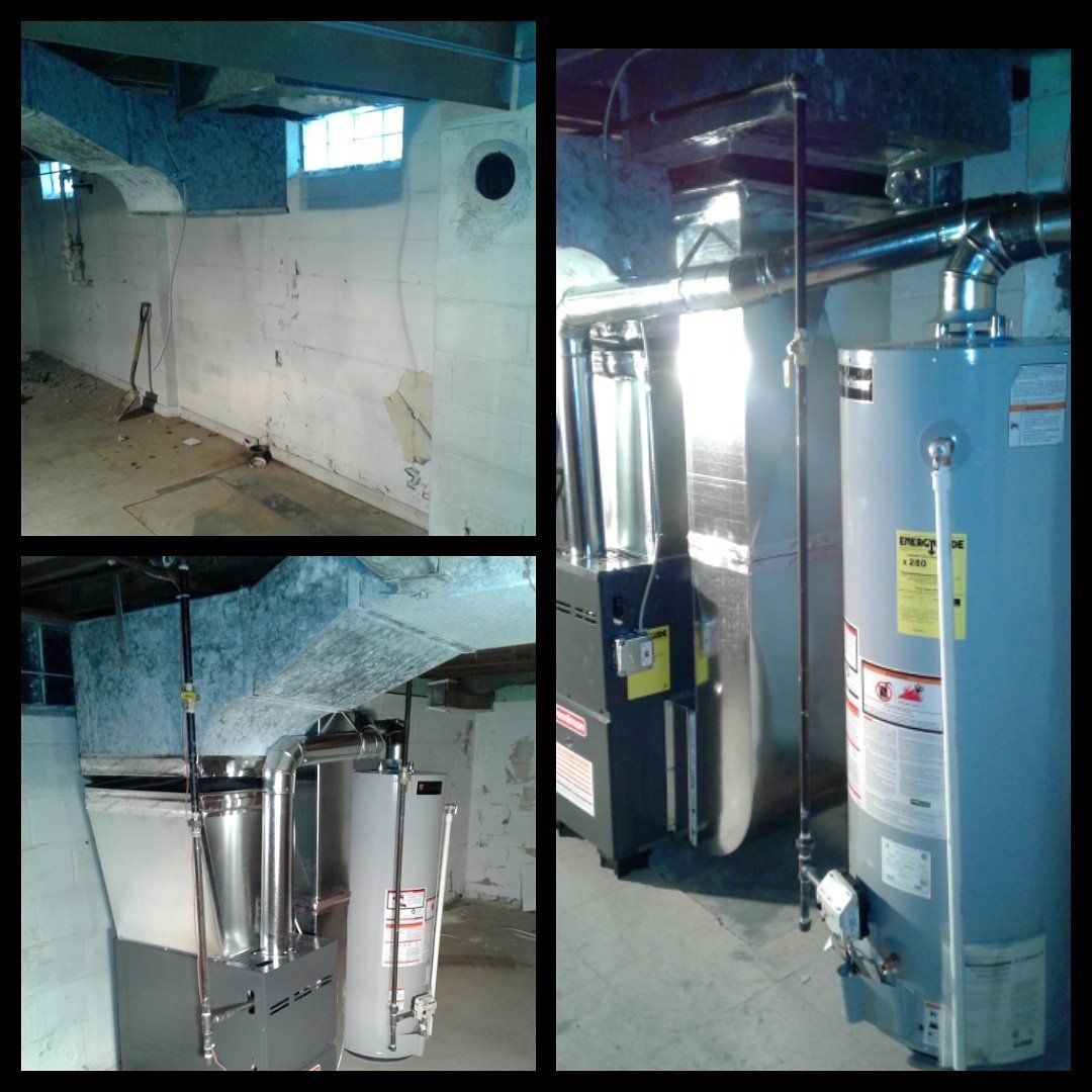 Basement with water heater, furnace, and exposed concrete walls.
