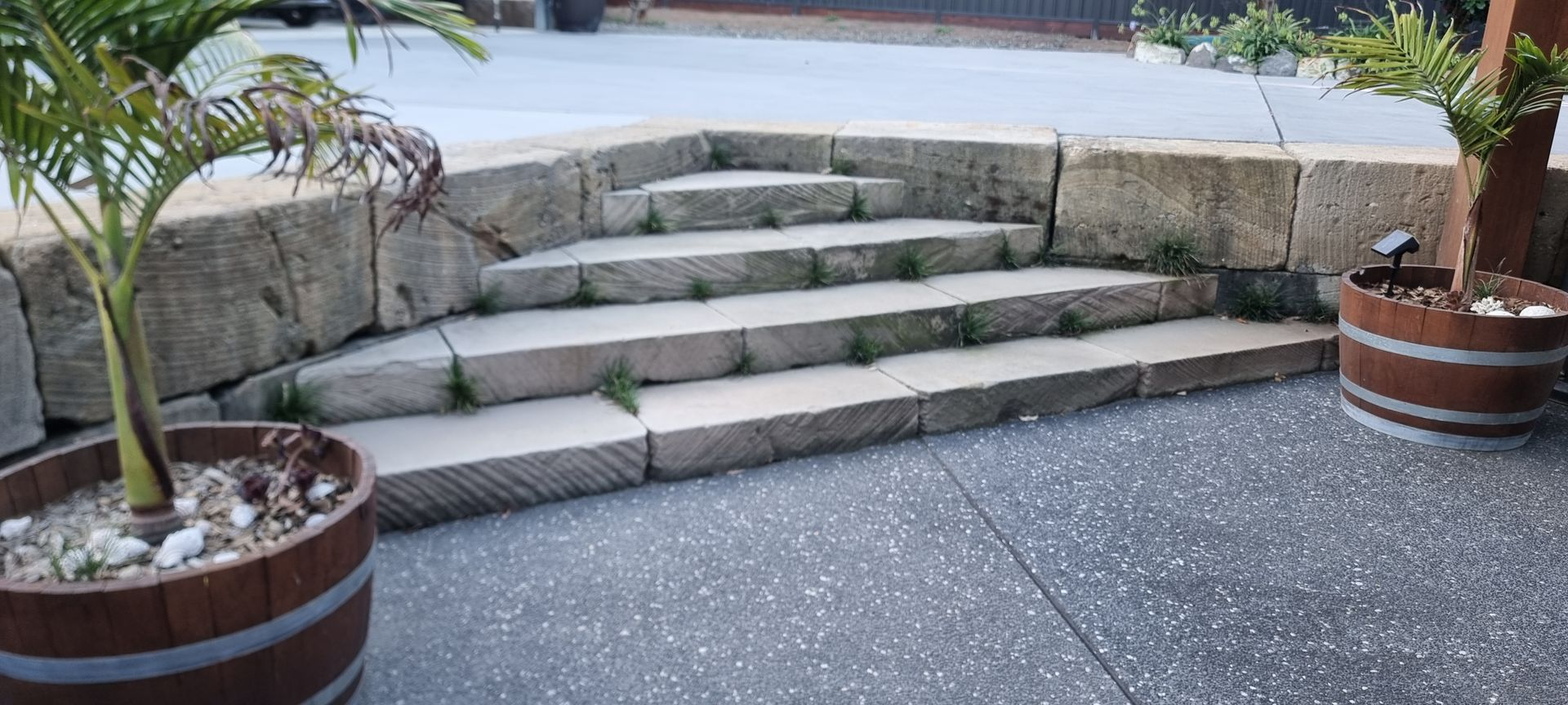 Sandstone block retaining wall with sandstone stairs
