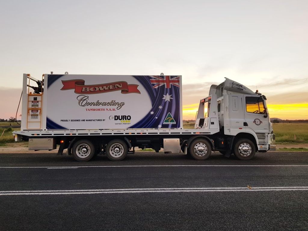 Forklift Handling Container Box Loading At The Docks Port From Train To Truck — Reliable Heavy Machinery in Tamworth, NSW