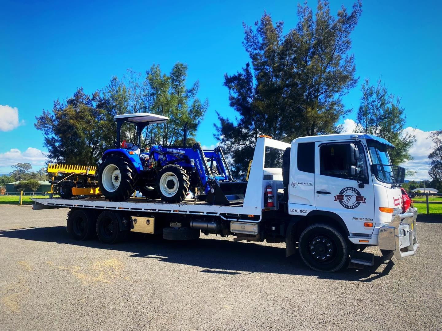 Towing A Blue Tractor