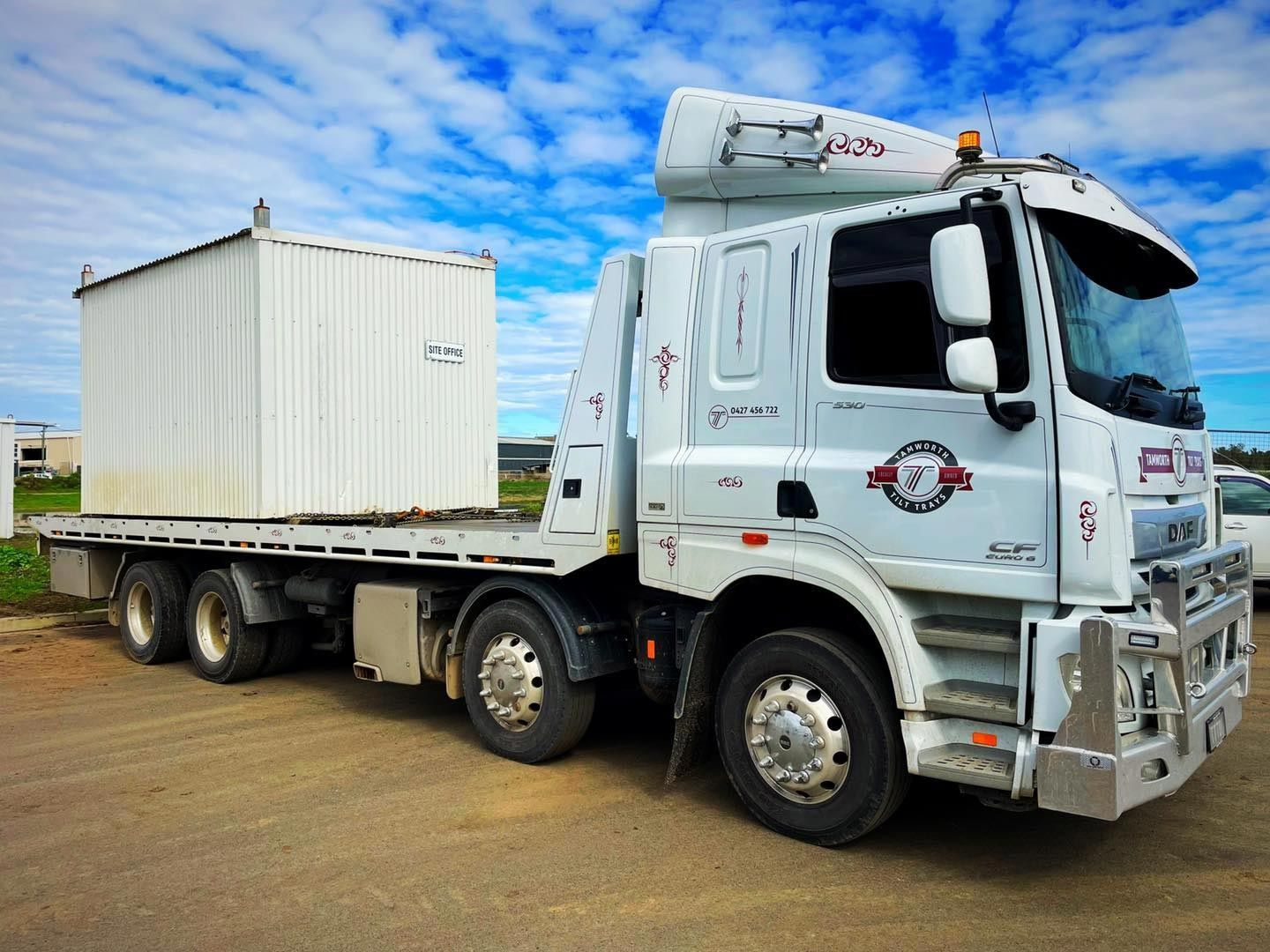 Towing A White Shipping Container