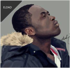 Portrait of Eldad looking upwards; wearing a jacket with fur trim; gray background.