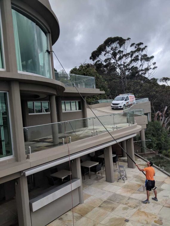 glass wall being cleaned