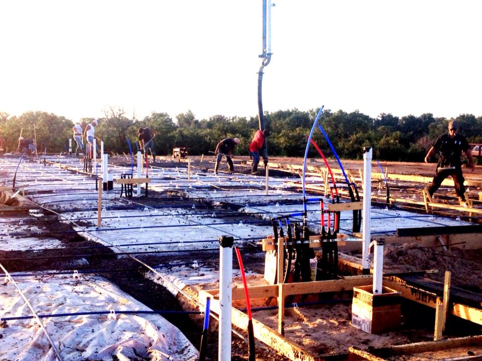 A group of people are working on a construction site