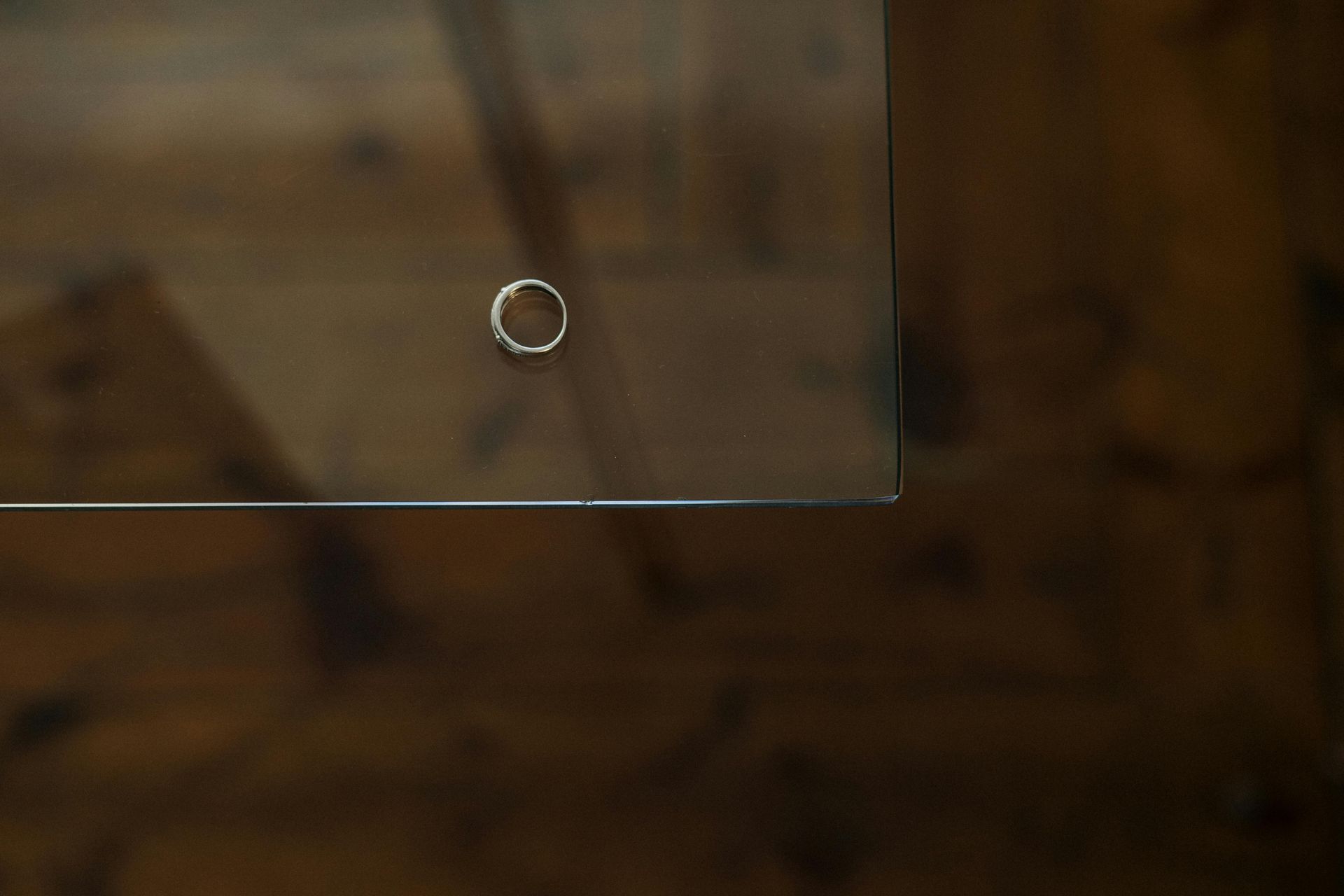 A close up of a glass table with a hole in it.