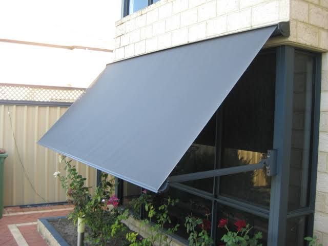 A Window With A Gray Awning Over It — Homemakers Lifestyle In Maroochydore, QLD