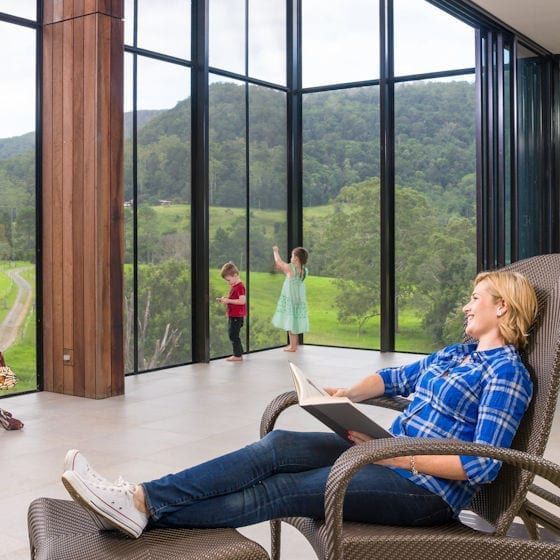 Patio Enclosure with Children and Parent — Homemakers Lifestyle Maroochydore In Maroochydore QLD