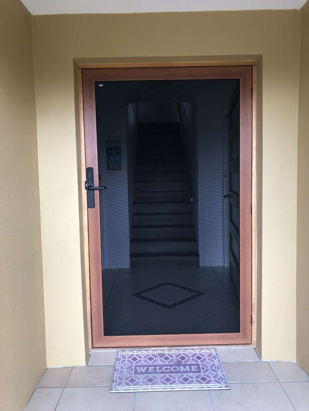 A Door With A Welcome Mat In Front Of It  — Homemakers Lifestyle In Maroochydore, QLD