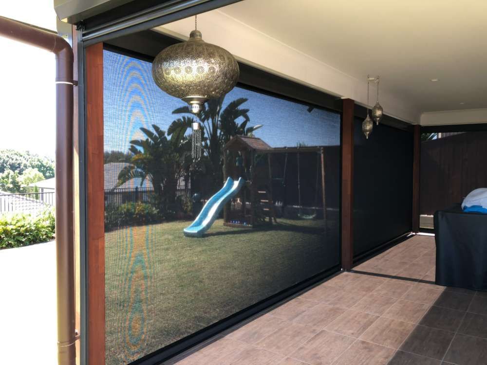 A Patio With A Slide And A Lantern Hanging From The Ceiling — Homemakers Lifestyle In Maroochydore, QLD