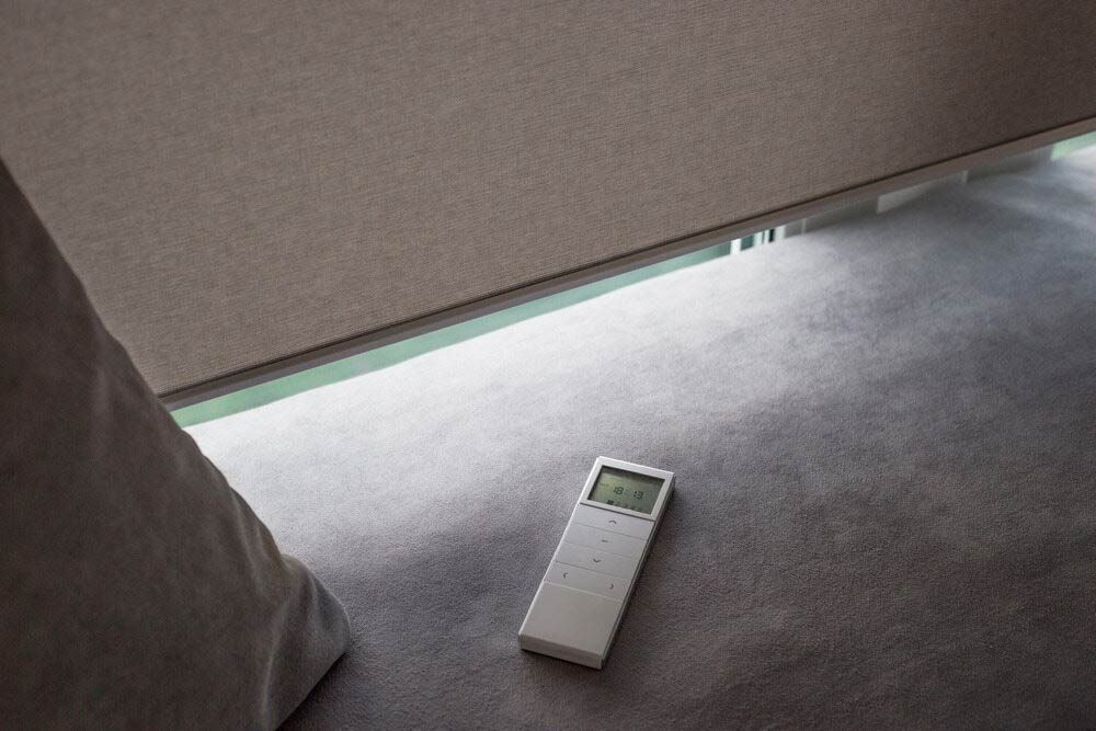 A Remote Control Is Laying On The Floor Next To A Blind — Homemakers Lifestyle In Nambour, QLD