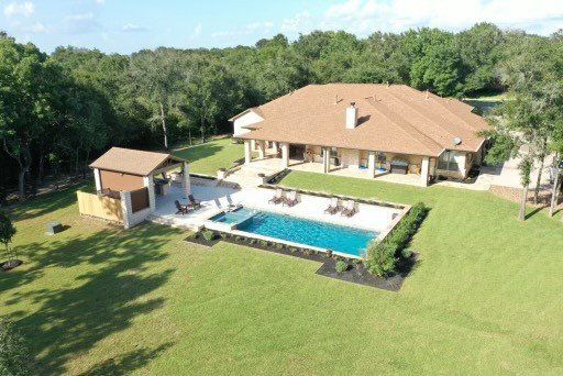 backyard outdoor kitchen and pool