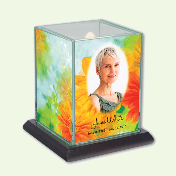 A square candle holder with photo on front