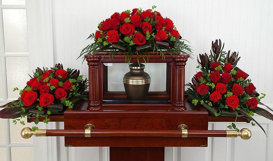 Urn Ark with flowers on top and sides