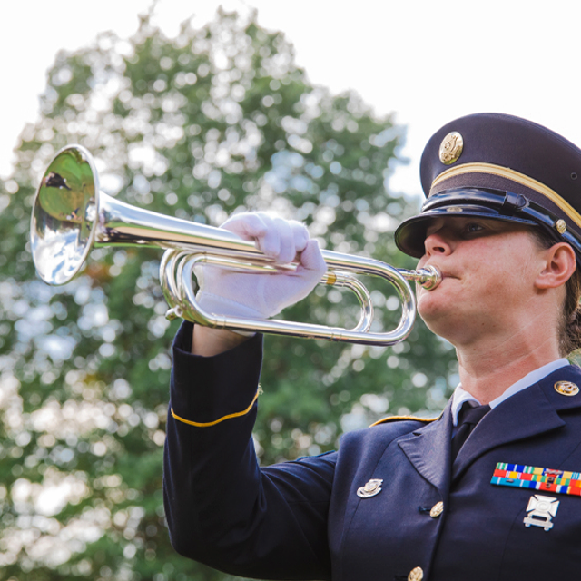 Bugle with draped American Flag