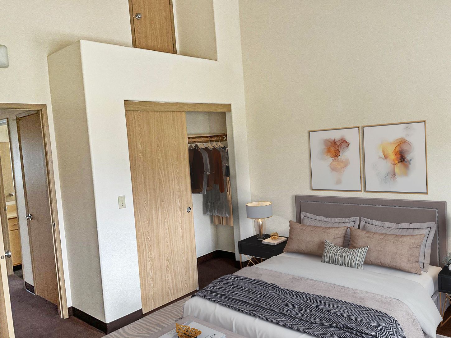A bedroom with a large bed and a closet