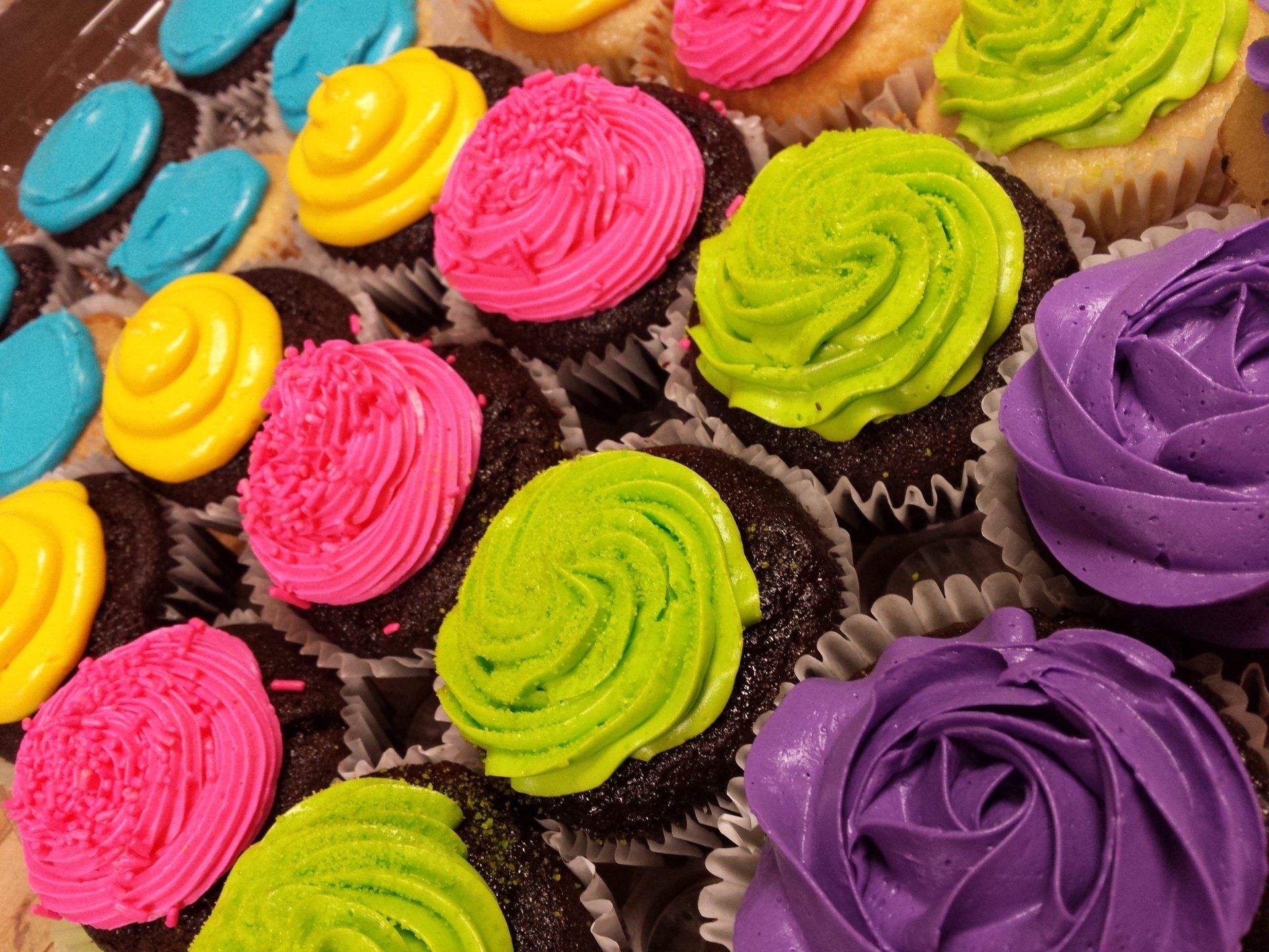 Cupcakes with bright neon colored icing