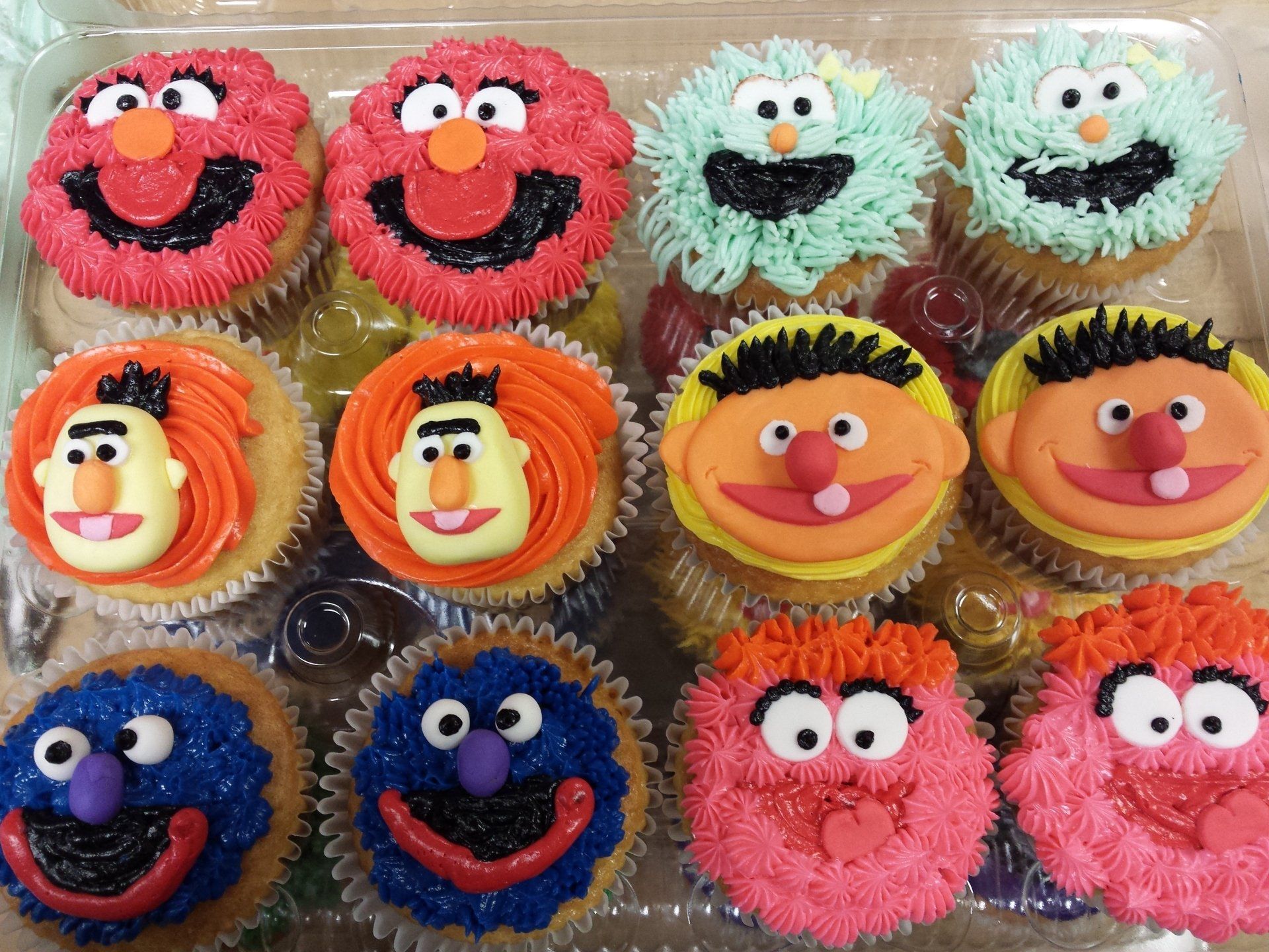 Cupcakes with Sesame Street character faces
