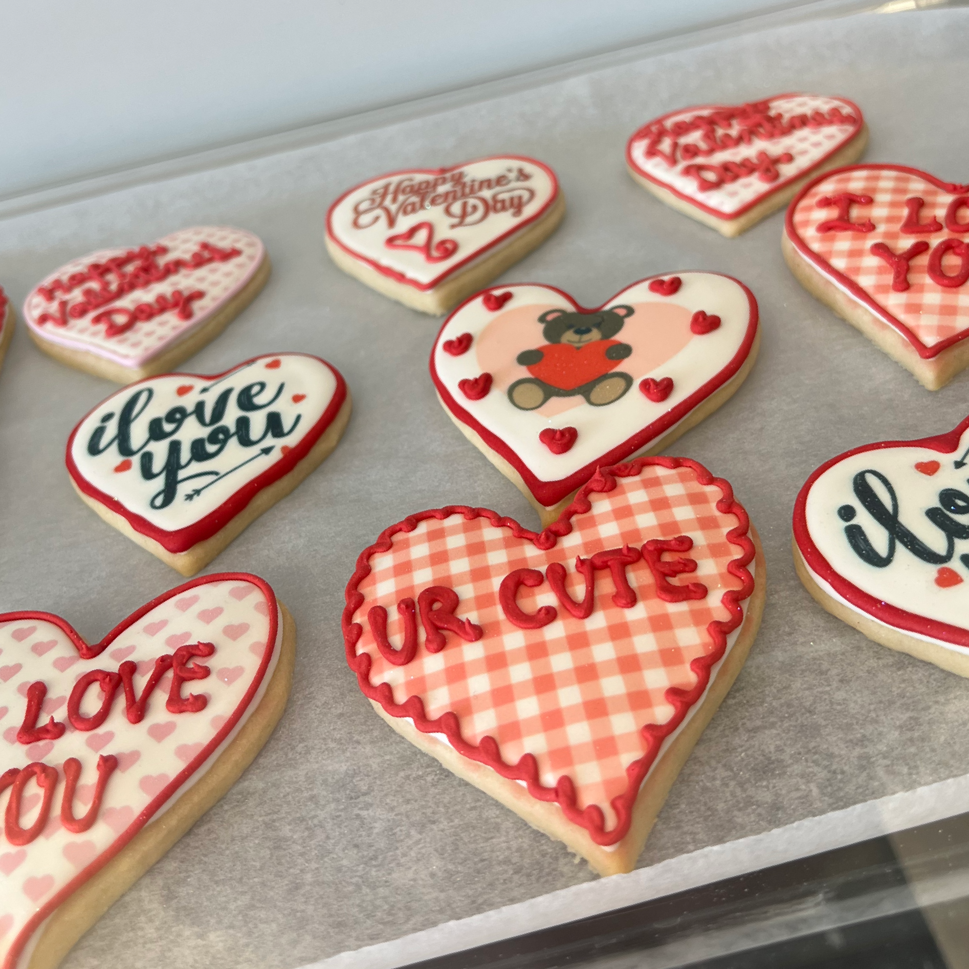 Heart shaped cookies with royal icing and valentine messages