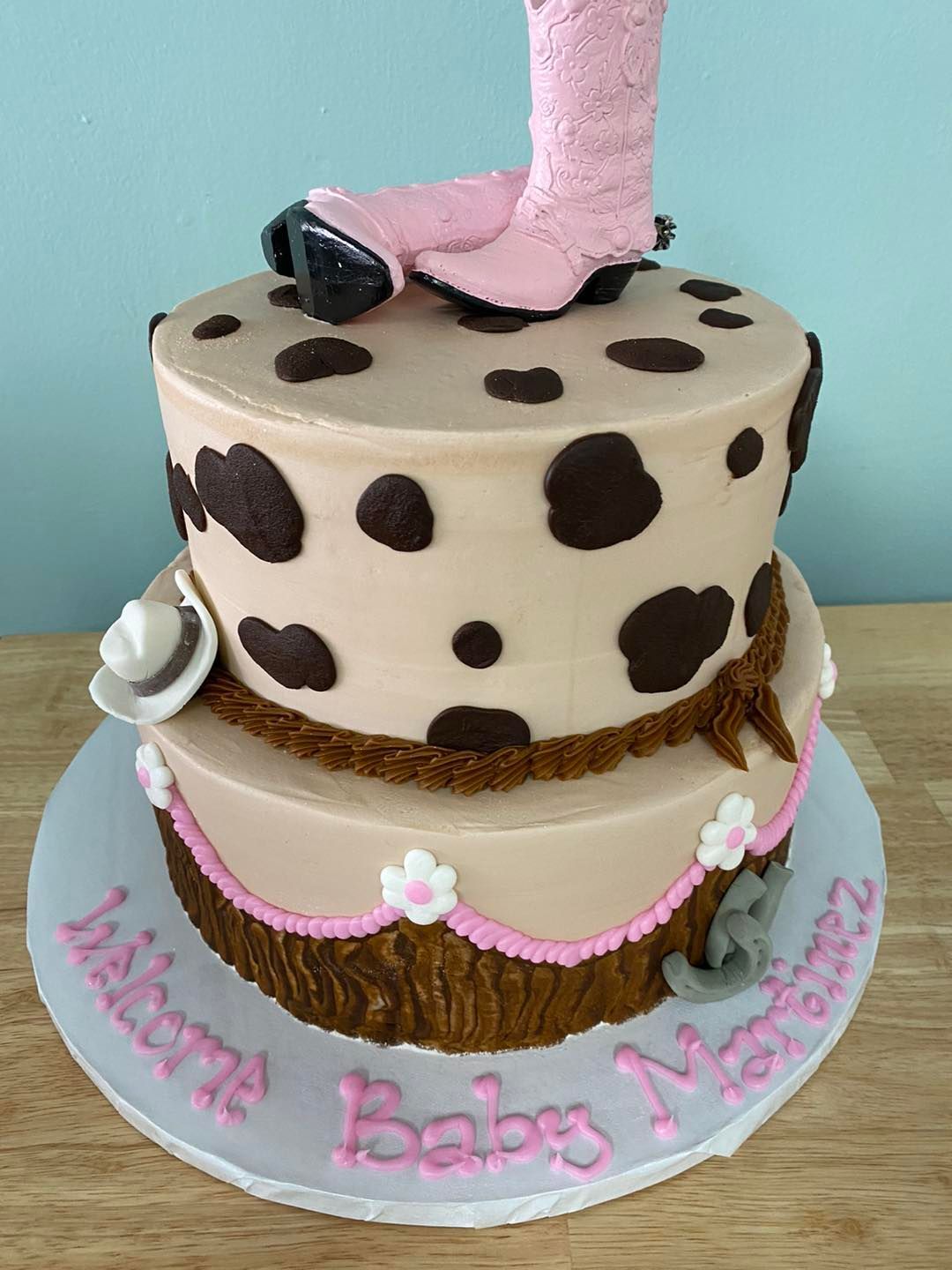 western themed cake with iced cow spots