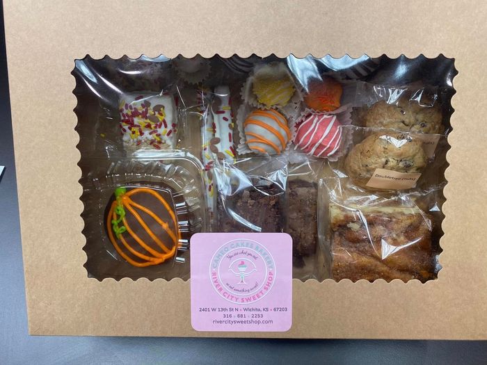 a gift box full of baked goods