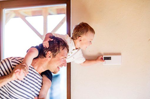Air conditioning systems being used by a family in Caloundra