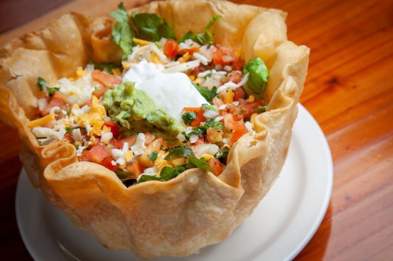 Alota Tostada is one of the fresh Mexican food favorites at Jim & Rob's