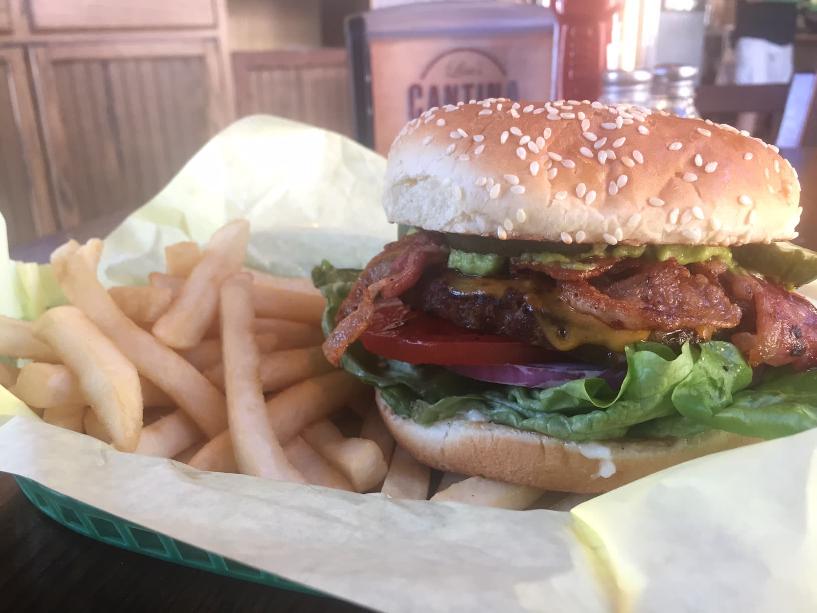 Bacon cheeseburger and fries photo