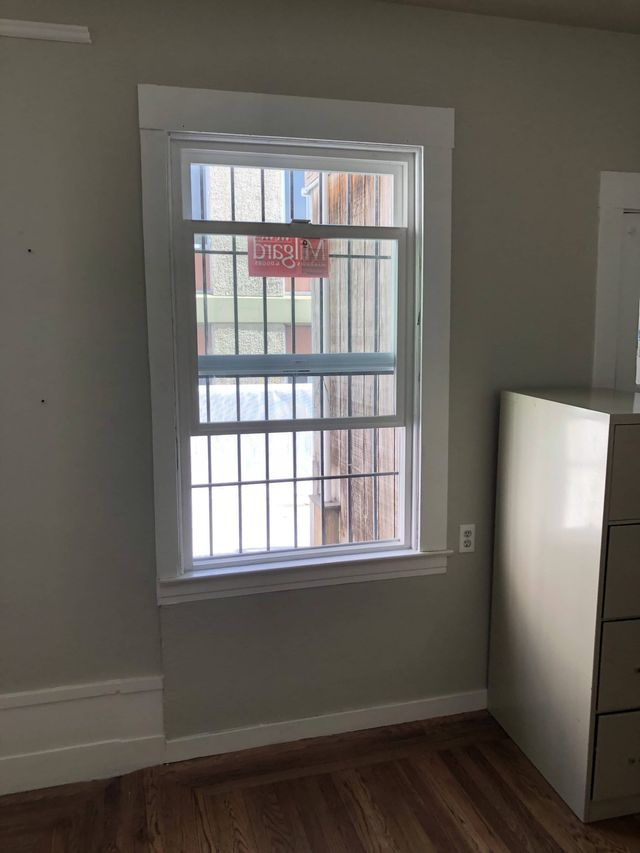 Medium Shot of A Glass Window with Grills | San Francisco, CA | Theisen Glass