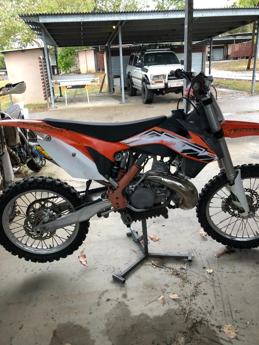 Orange and Black Dirt Bike on a Stand, Parked Under a Carport — Bodes All Mechanical In Bermagui, NSW